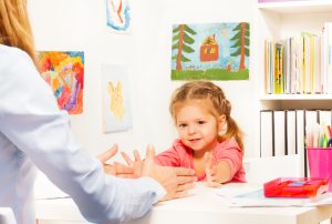 Toddler receiving applied behavioral analysis